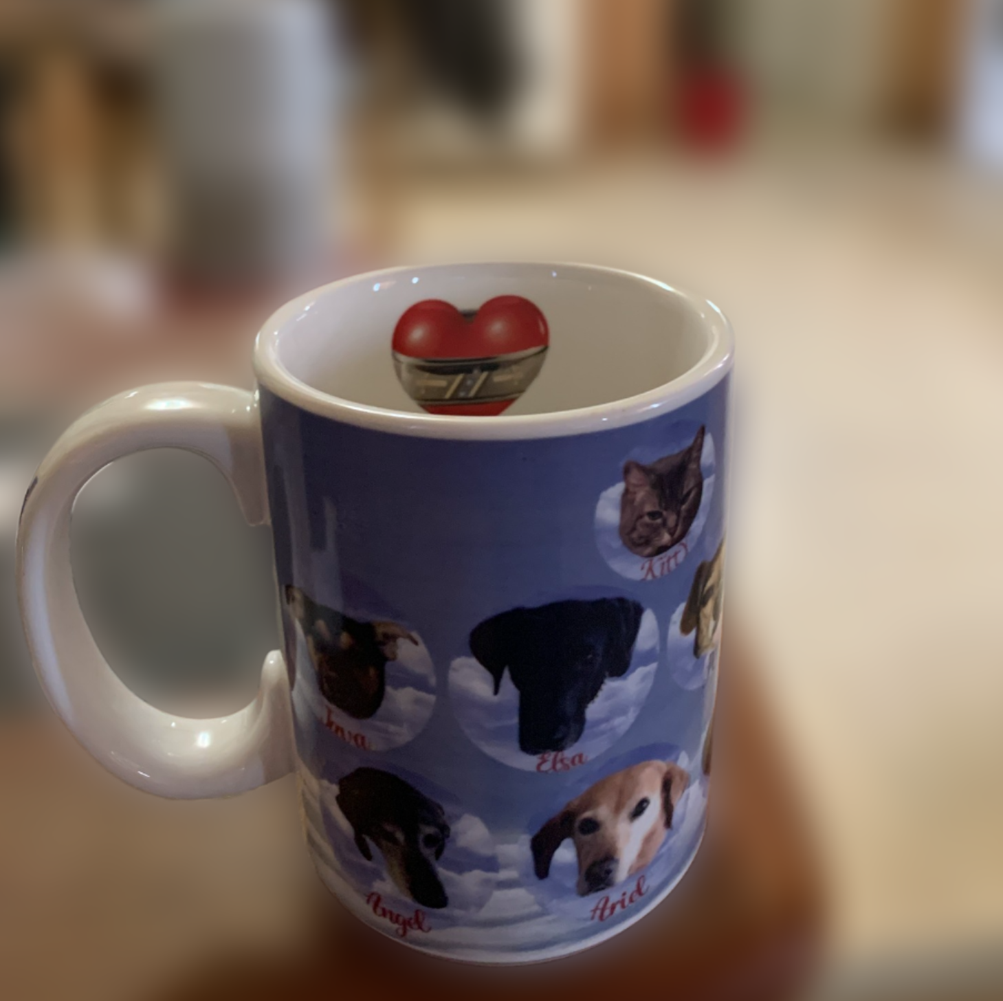The Mugs Were Printed With Photos Of HIs Pets Through The Years